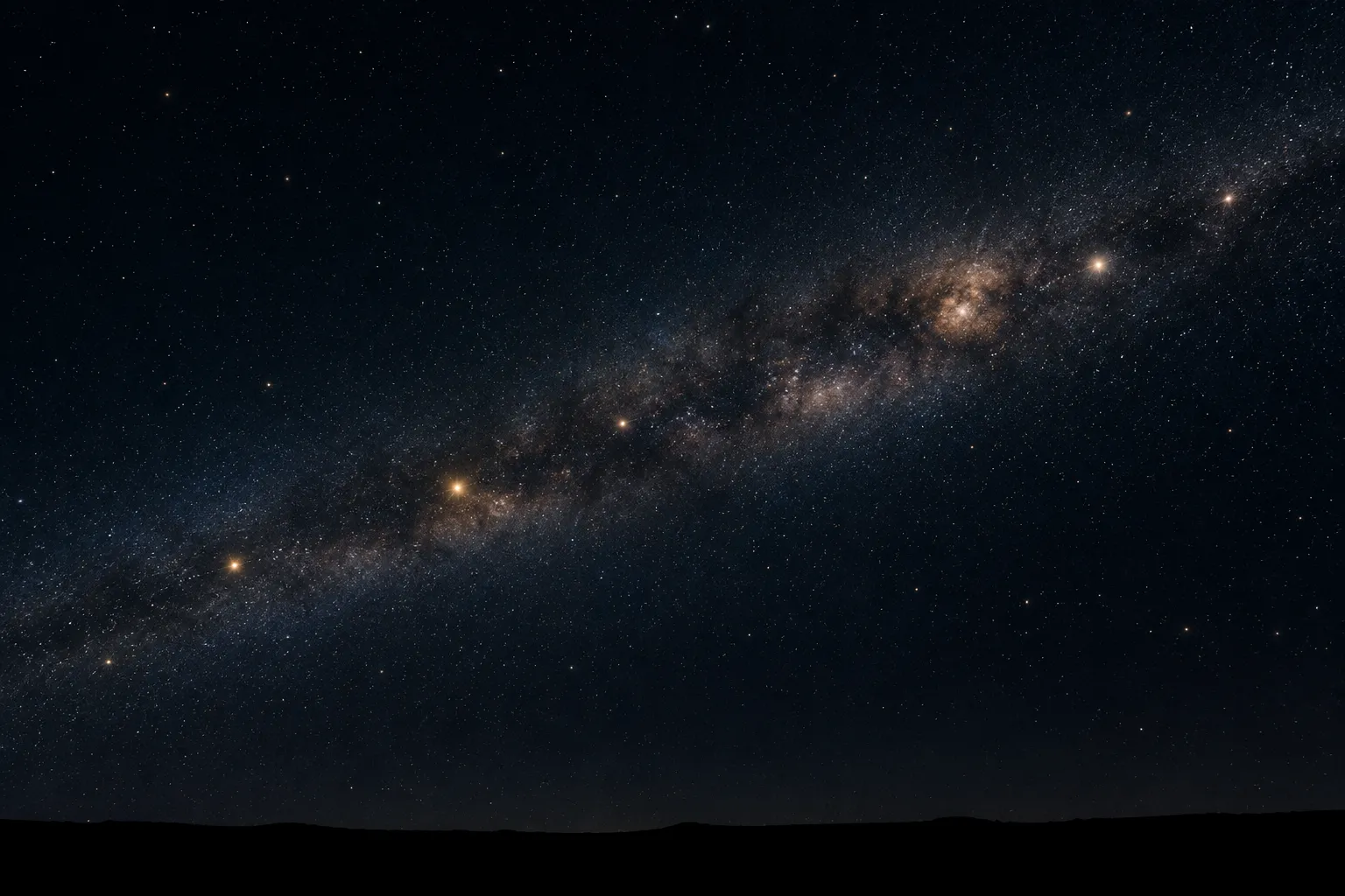 A band of constellations along the ecliptic above a dark horizon.