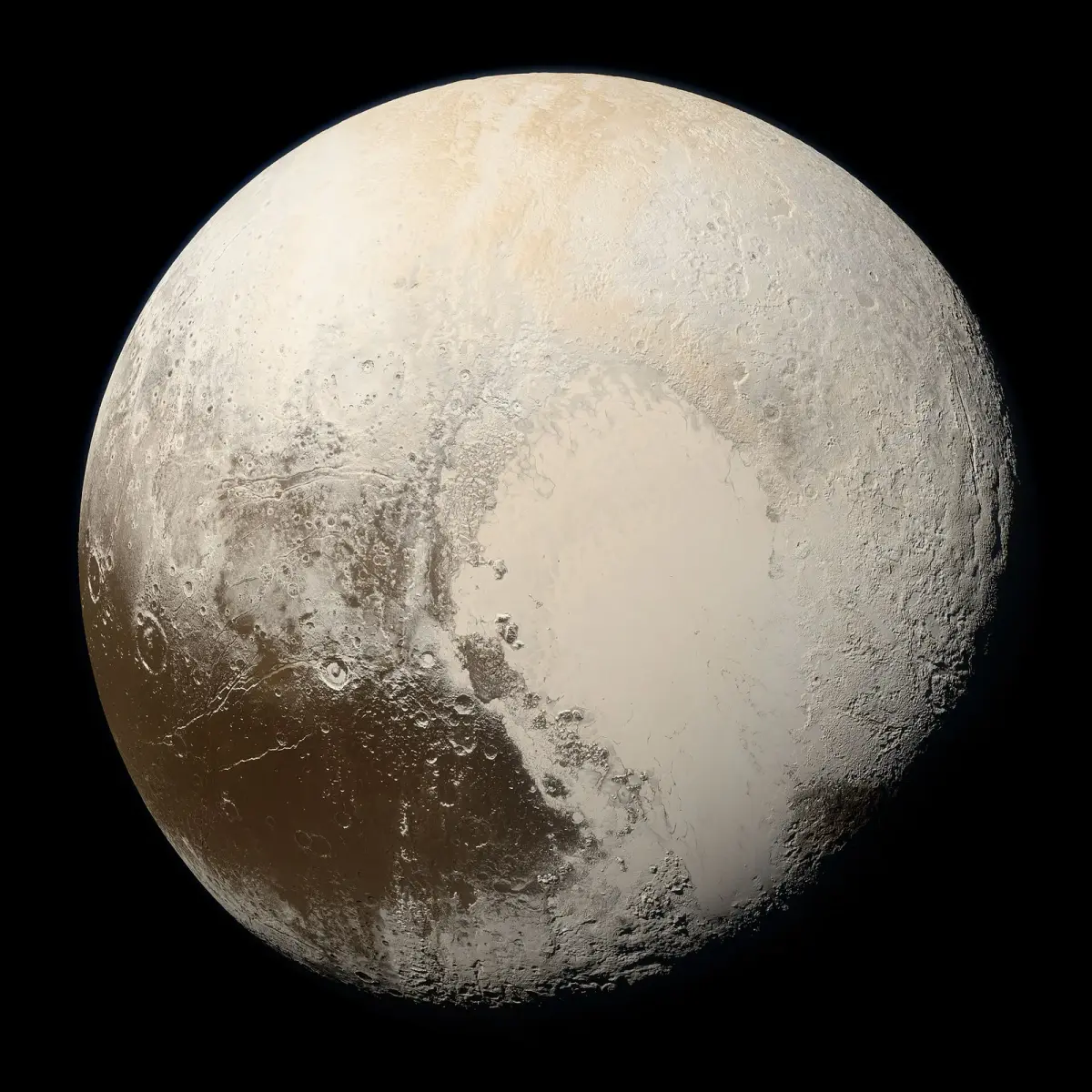 Pluto in true colour, a pale tan world with a large bright heart-shaped plain.