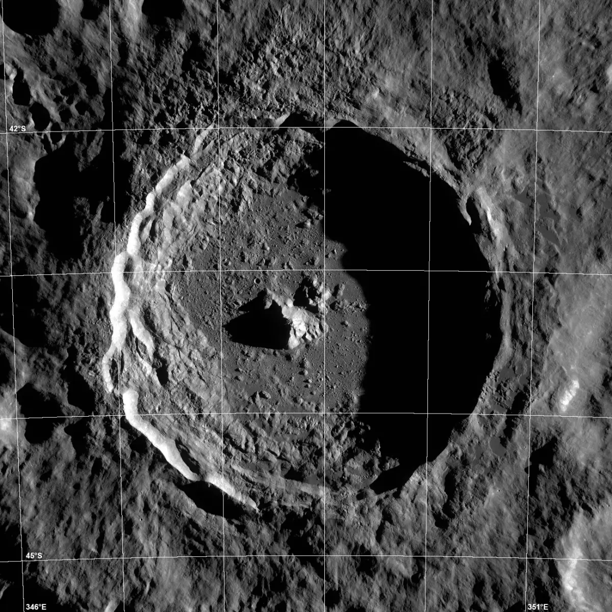 Tycho crater from above: a sharp round rim, terraced walls and a central peak.