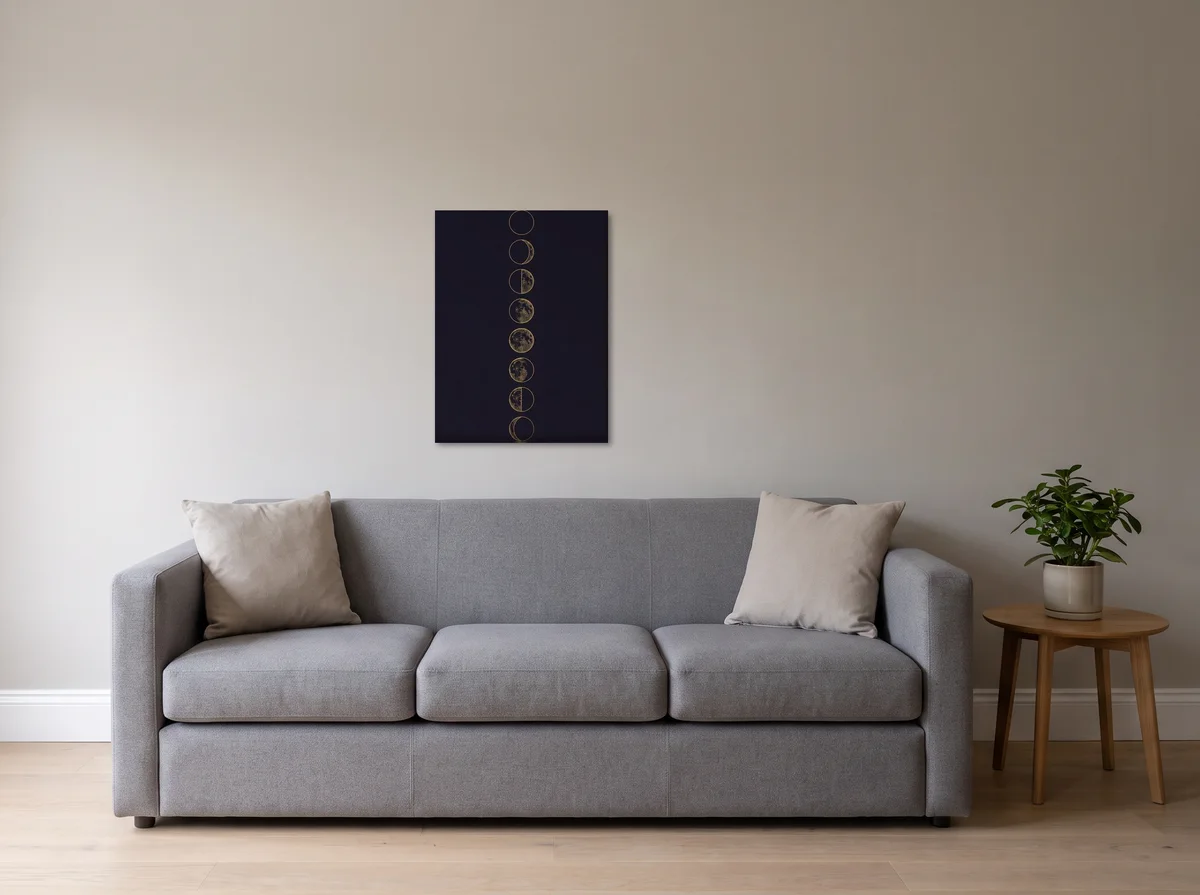 Lunar Phases as a 60x80 cm canvas on a light grey wall above a grey sofa