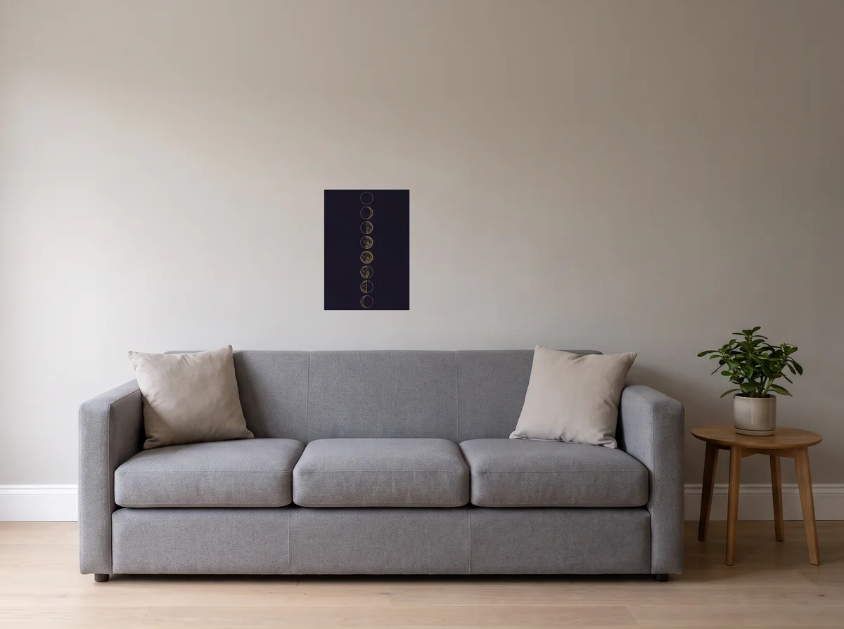 Lunar Phases as an A2 poster on a light grey wall above a grey sofa