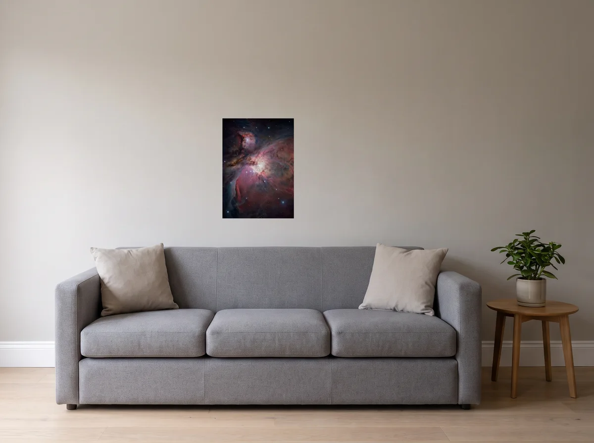 Orion Cradle as a 50x70 cm poster on a light grey wall above a grey sofa