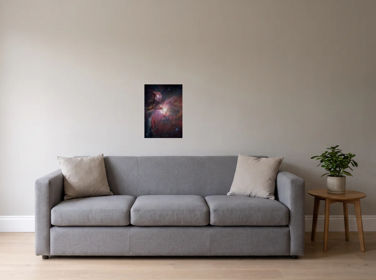 Orion Cradle as an A2 poster on a light grey wall above a grey sofa.