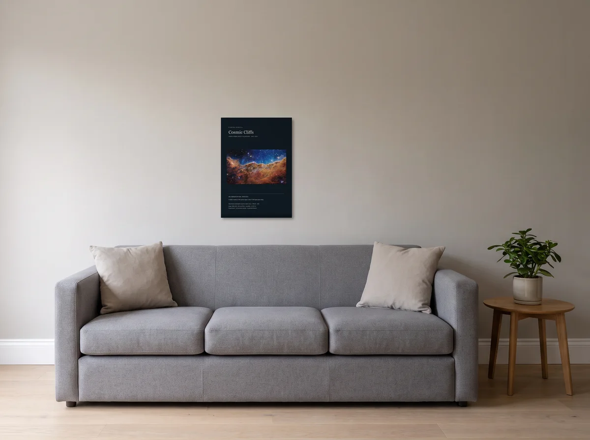 Cosmic Cliffs as a 50 x 70 cm canvas on a light grey wall above a grey sofa.
